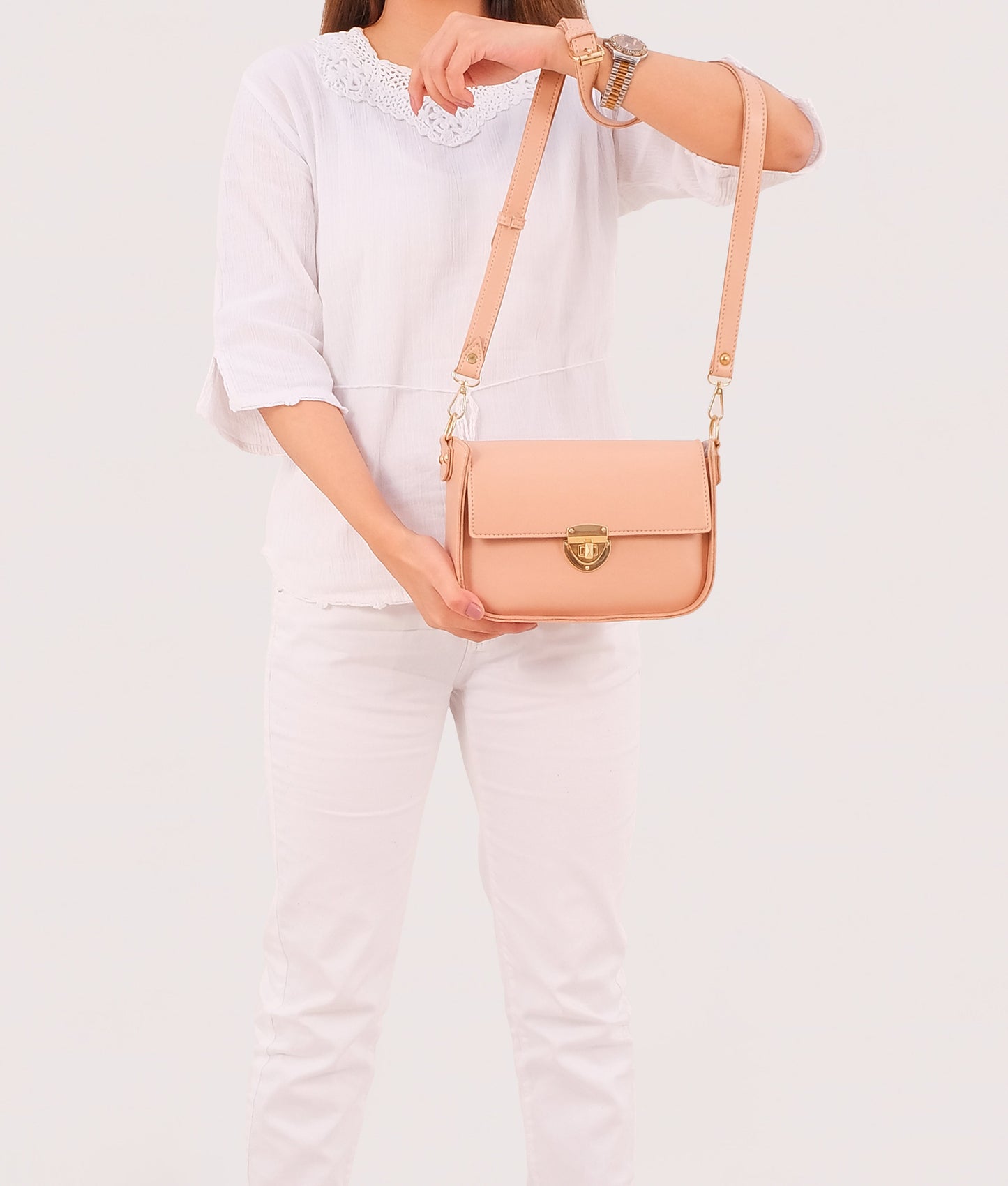 Peach saddle bag with twist lock